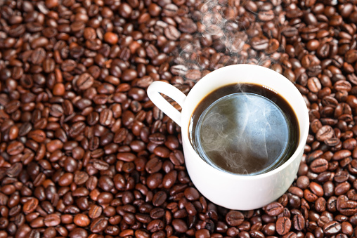 cup of coffee and coffee beans